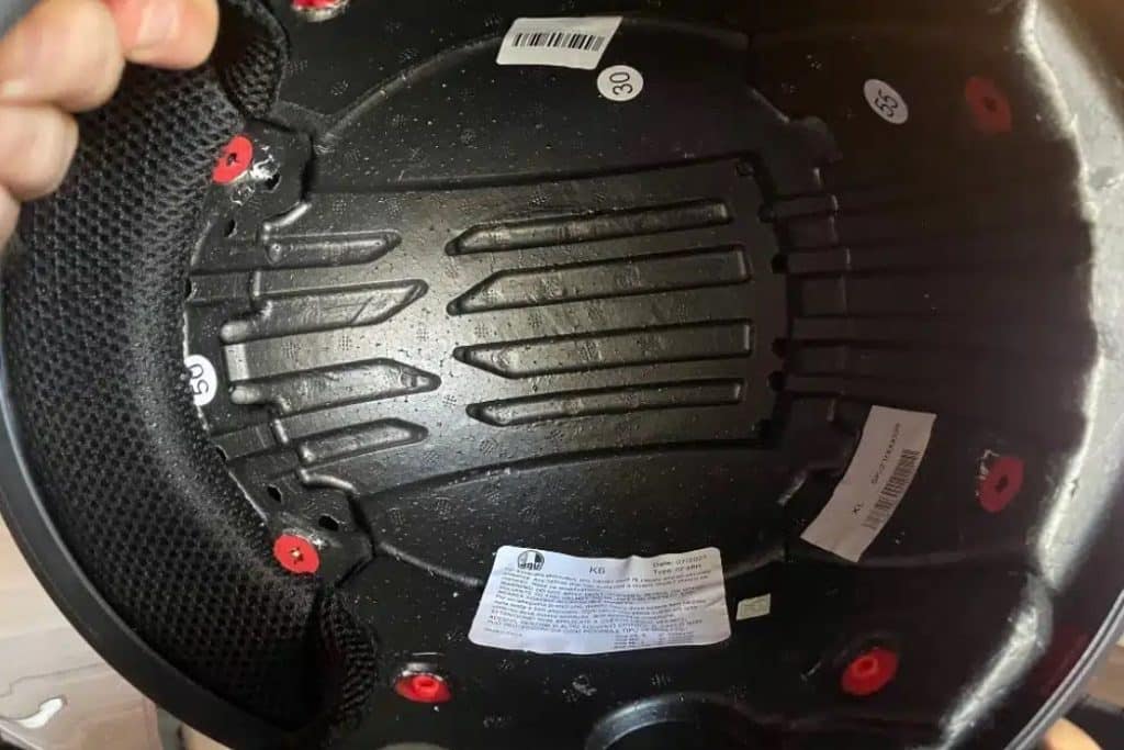 The interior view of the AGV K6 helmet reveals the comfort liner and EPS liner, highlighting its design for optimum comfort and safety.