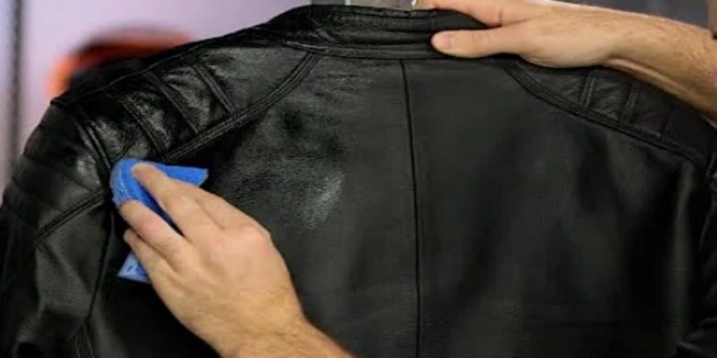 How Do You Break in a Motorcycle Race Suit? My 7 Dos And Don’ts Using a sponge to work leather conditioner into the shoulders of the jacket. Conditioning restores the sheen and softness of the garment, allowing it to stretch and feel more comfortable to wear.