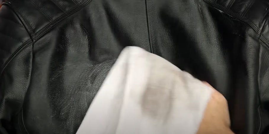 While cleaning the back with the clean side, flip the microfiber cloth over to the dirty side to avoid spreading dirt and grime.