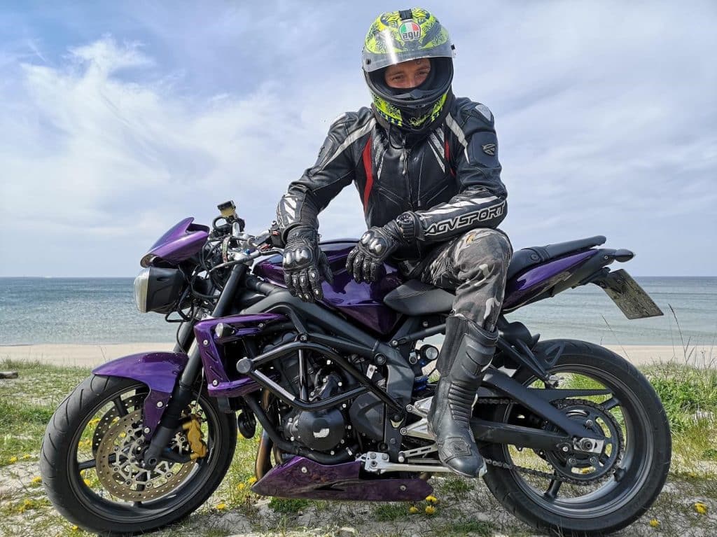 Sporting AGVSPORT racing leather jacket: seated on my motorcycle in style.