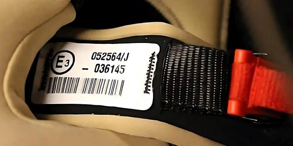 The ECE 22.06 homologation mark is quite distinctive – it's encircled. That prominent 'E' country code followed by a number tells you which nation has tested and given the green light to the use of the motorcycle helmet.