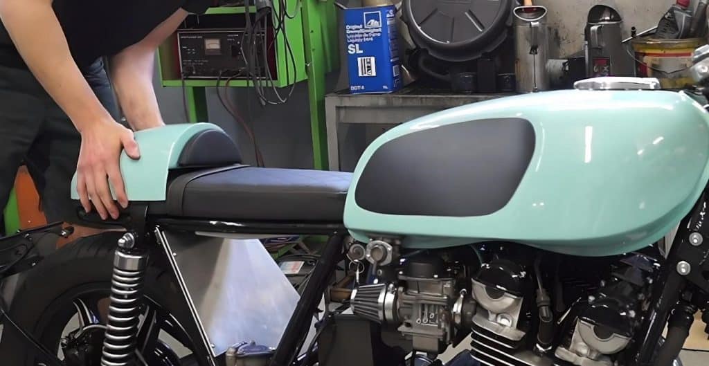 Trying on the custom seat cowl for size. Here, we are not bound by the traditional units of measurements but rely more on what we can perceive with our eyes. In the end, it will feel like a trial-and-error thing, and you may have to redo it a couple of times to get the perfect result.