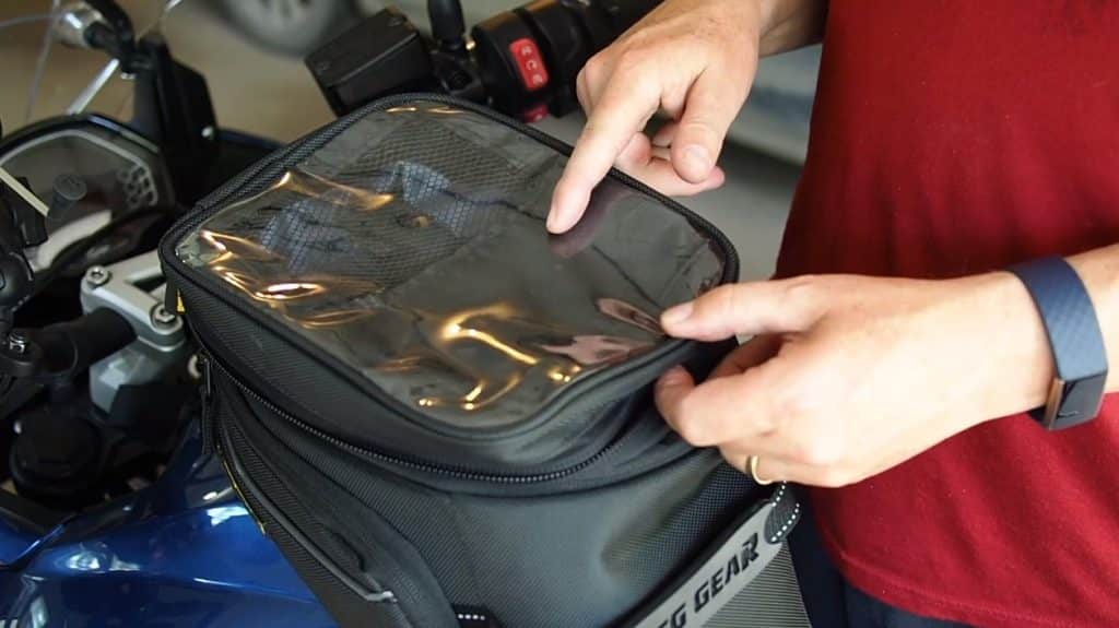 Checking out the Nelson Rigg Trails End Adventure Tank Bag with a zipper-controlled 30% expansion for when you need to bring along extra items. This tank bag is part of the Rigg Gear Adventure line of products, known for their iconic durability and impeccable online reputation.