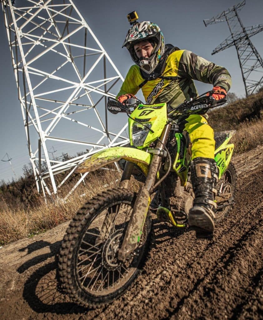 Do You Need Tall Motorcycle Boots? Explore the Pros and Cons Denis Grachev sporting AGV AX-8 off-road helmet along with the Garne MX Boots, as he extends the leg to counterbalance and steer through a turn. It's easy to see why attempting this maneuver with short motorcycle boots or regular work boots could result in a broken leg or a sprained ankle. In dirt biking, where speeds range from 50-100 km/h, off-road boots prioritize twisting and jamming prevention over abrasion resistance, featuring a tall and sturdy design. In contrast, road racing boots are shorter, thinner, and lighter, emphasizing abrasion resistance.