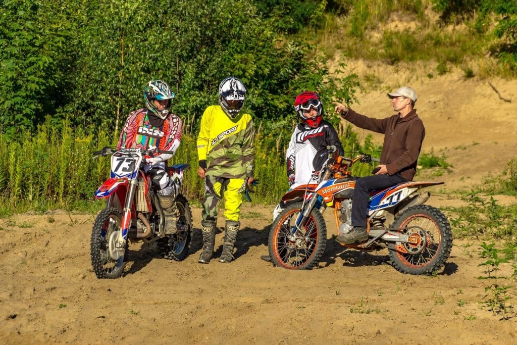 Off-road safari in South Africa with Denis Grachev from Off Limits Tours. Various riding boots displayed, including off-road, adventure, and work boots. Specialized gear ensures enhanced protection and peace of mind while riding in the great outdoors.