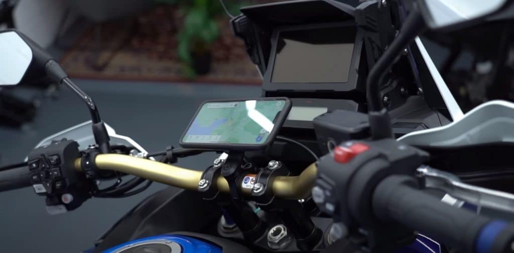 On the Honda CRF1100L Africa Twin, the Quad Lock holds the iPhone in just the right spot for visibility while riding in the upright position, substituting the main navigation radar further ahead. In this position, it's next to impossible to crash your phone in case you have to dampen the bike. Speaking of which, the trending topic this week is how the latest iPhone owners have been bricking the NFC chips on BMW cars’ wireless charging pads due to overheating, rendering contactless payments, certain digital car keys, and other features unusable.