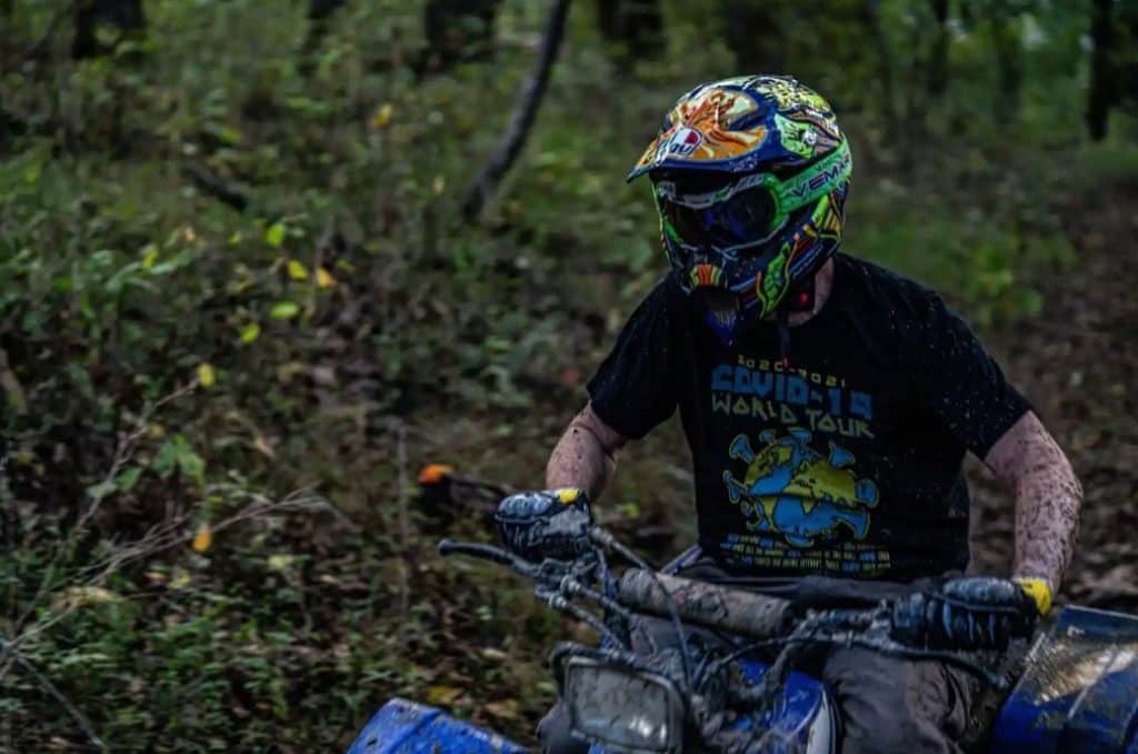 Is White Helmet Better Than Black? Loud Colors Save Lives The AGV AX-8 Rossi 5-Continents Evo helmet has endured its fair share of muck, testament to my intense ATV riding escapades. Despite the grime, its vibrant multicolor design maintains visibility.