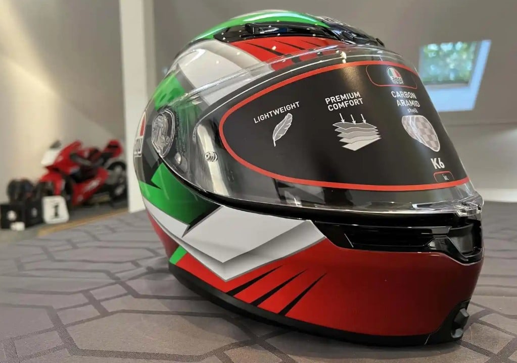 Is White Helmet Better Than Black? Loud Colors Save Lives The AGV K6 S Excite Camo/Italy helmet—displayed in my Maryland office—in vibrant red, green, and white, not only adds a touch of style but also offers more than just aesthetics. Its tricolor design, featuring high-visibility colors, contributes to a statistically advantageous profile.