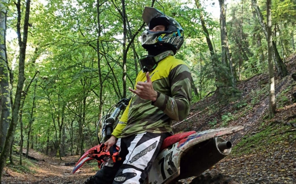 Is White Helmet Better Than Black? Loud Colors Save Lives Much like the multicolored AX-8 Evo Carbo Green/Gray helmet, the neon yellow AGVSPORT hi-viz motorcycle clothing, as showcased by the renowned stunt rider Denis Grachev, not only enhances visibility but also remains noticeable even amidst mud splatters.