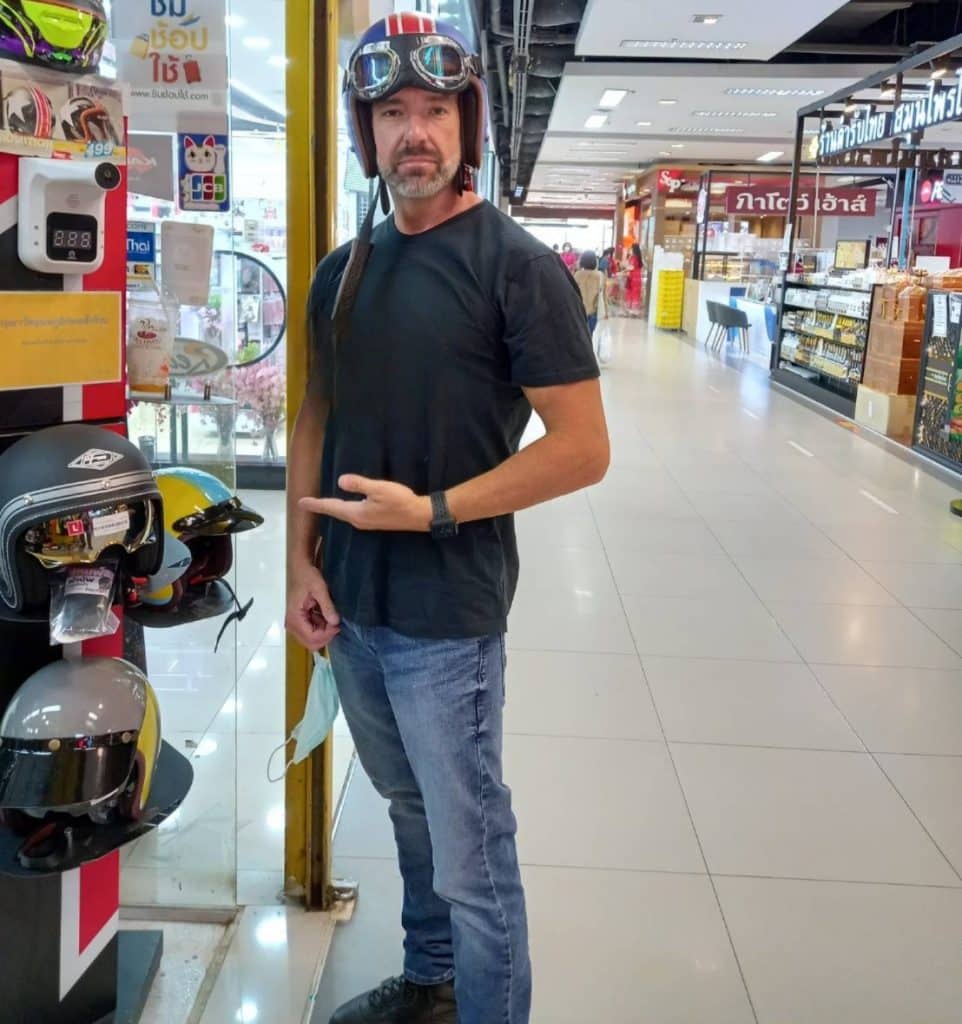 Top 5 Best Open Face Motorcycle Helmets Todd in Thailand Wearing an Open Face Helmet While Out Shopping