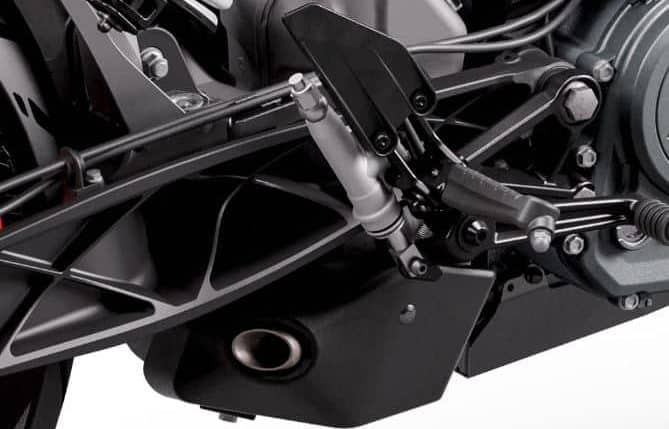 Though the exhaust might seem like an awkward blob with a prominent label, its three-chamber silencer is strategically placed near the bike's center of gravity, improving both balance and handling.