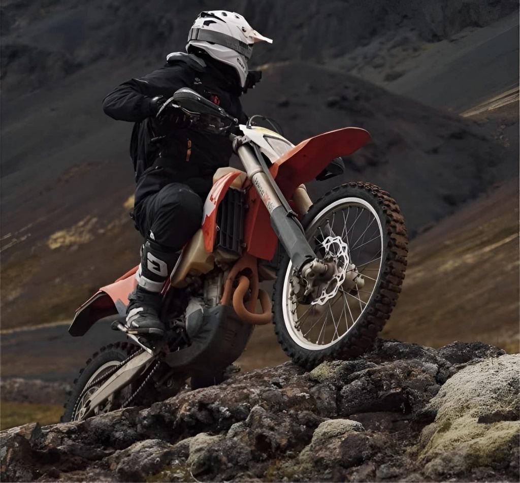 Charging up a rugged mountain trail in Northern Vietnam, the thrill of off-road motorcycling comes alive amidst raw terrain and sweeping vistas.