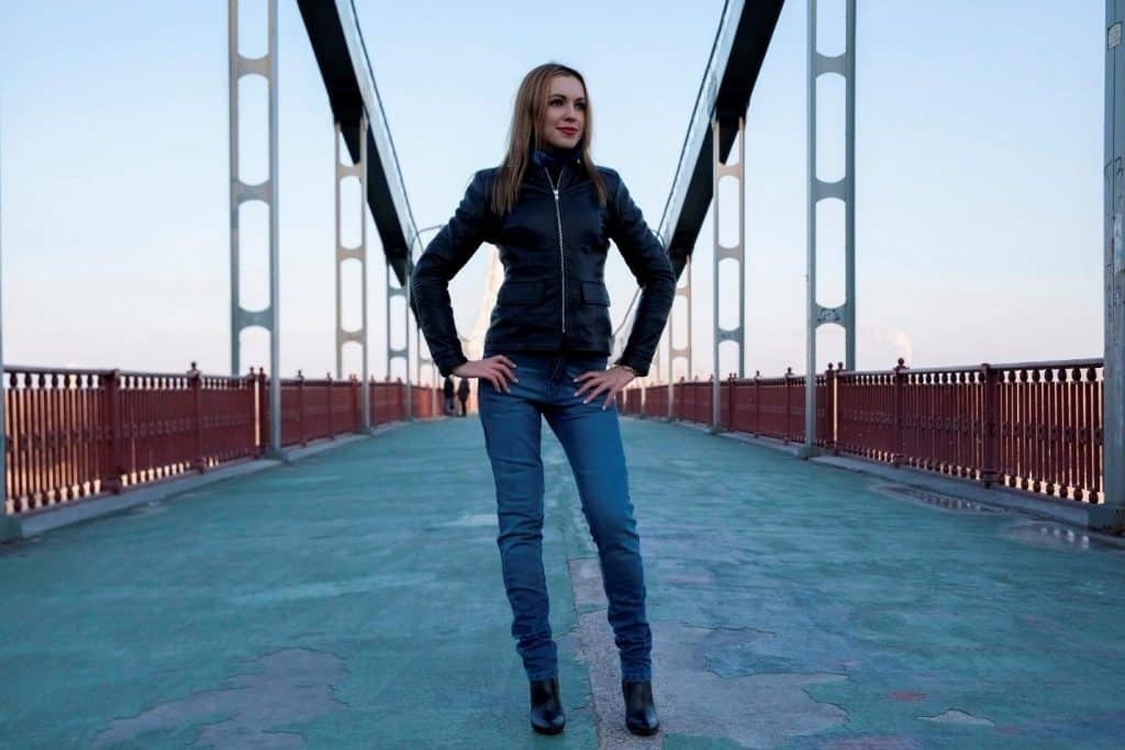 Elena exemplifies the stylish nature of motorcycle Kevlar jeans.