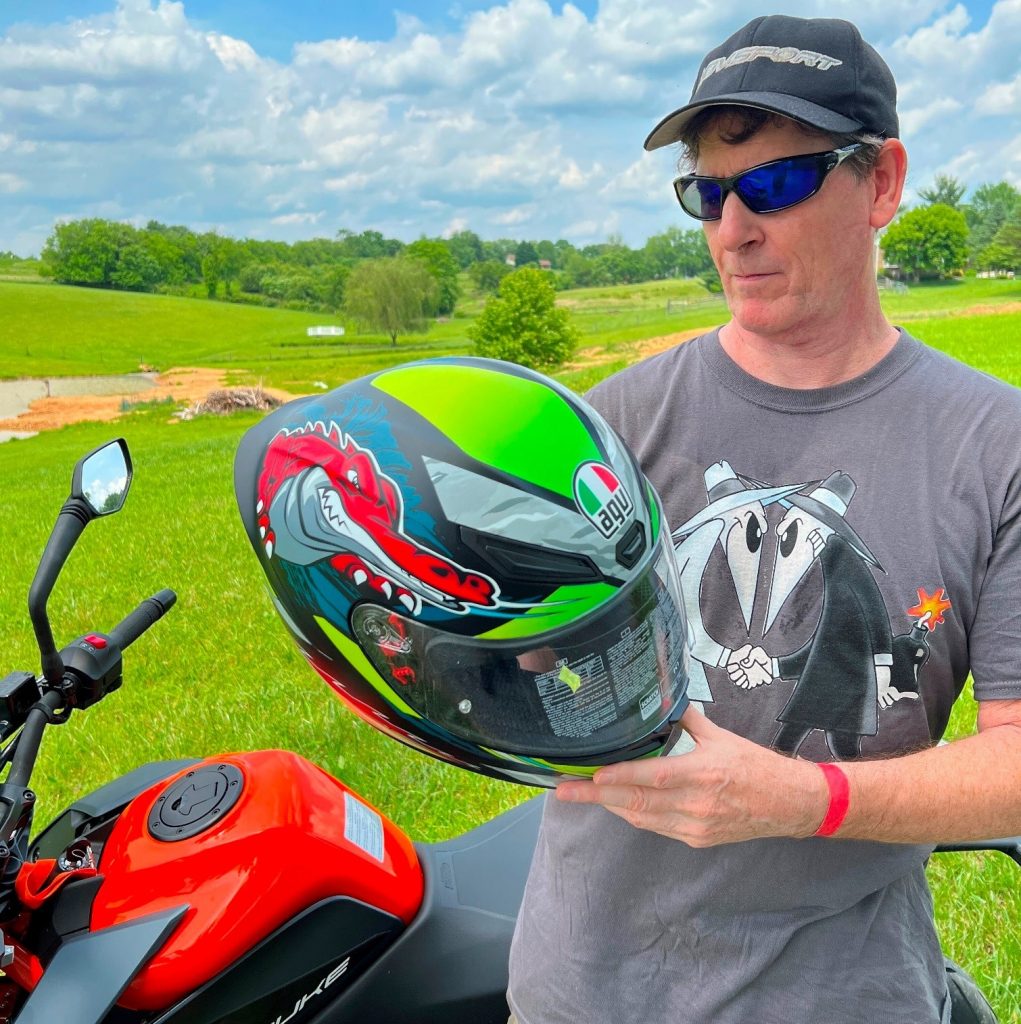 Checking my new AGV K1 S Dundee motorcycle helmet for a perfect fit by performing a series of static and dynamic tests to ensure it is snug, secure, and comfortable. 