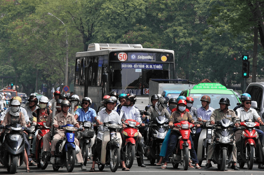 scooters crossing in Ho Chi Minh City